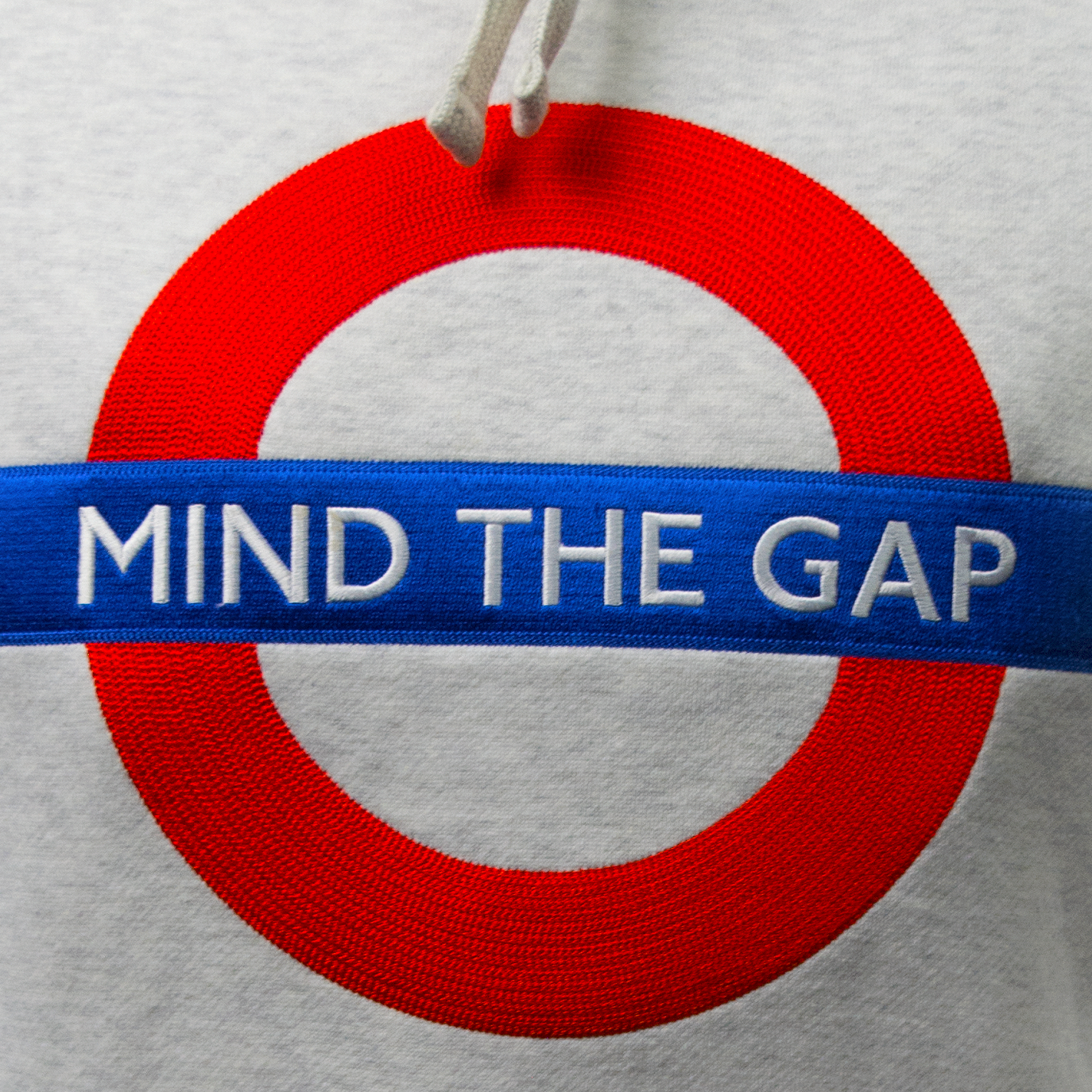 TFL129MTG ASH Licensed Unisex Mind the Gap Applique Embroidery Ash Grey