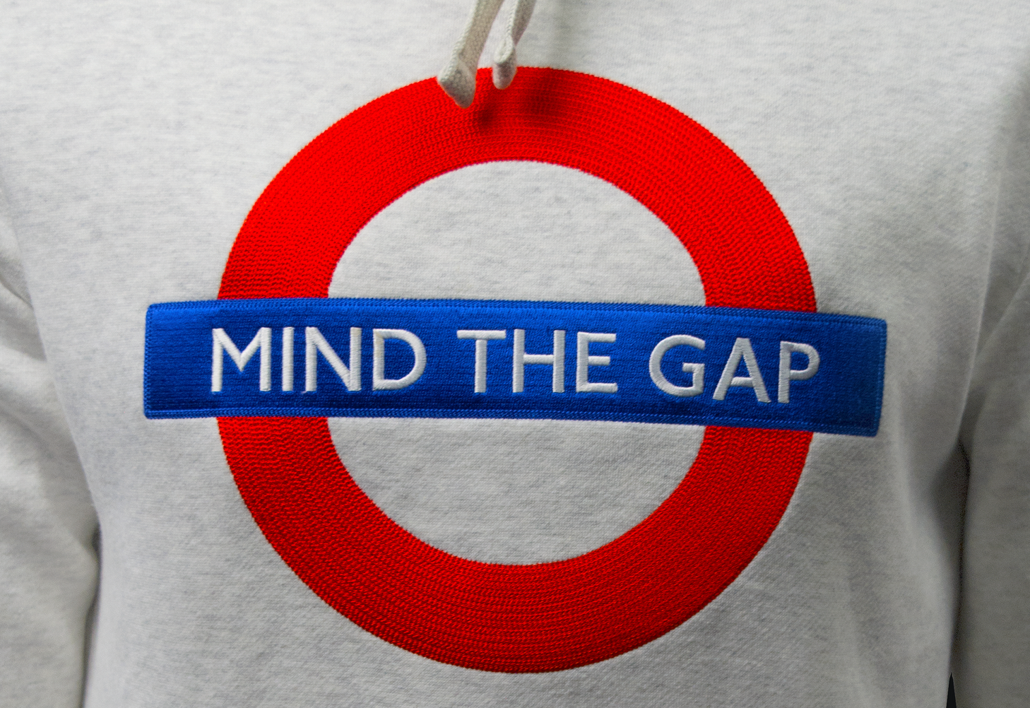 TFL129MTG ASH Licensed Unisex Mind the Gap Applique Embroidery Ash Grey